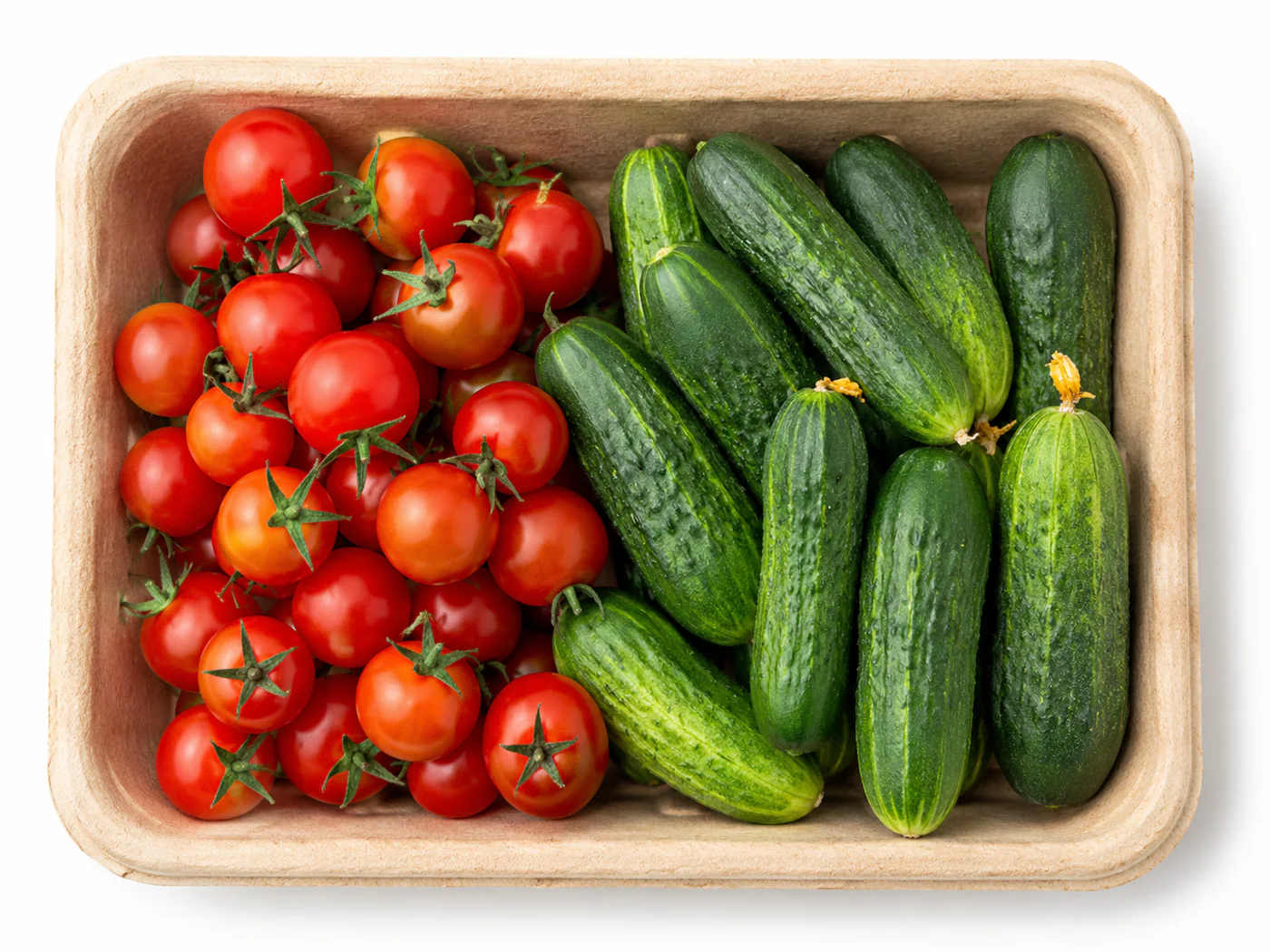 Fresh produce displayed in a molded bagasse tray