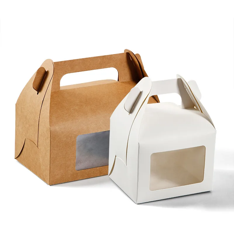 Kraft and white gable cake boxes with die-cut carry handles and front windows