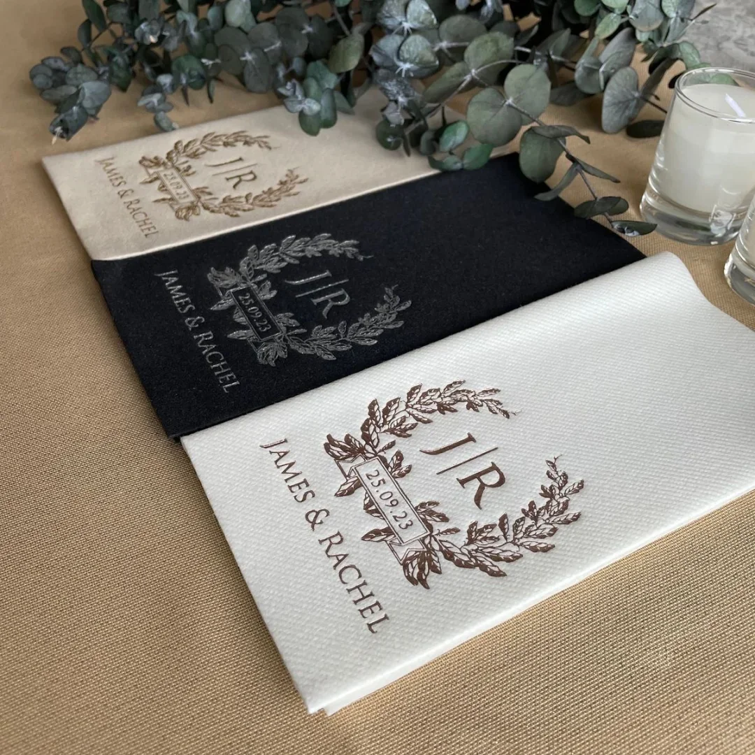 Custom printed napkins with gold and silver hot-stamped monograms