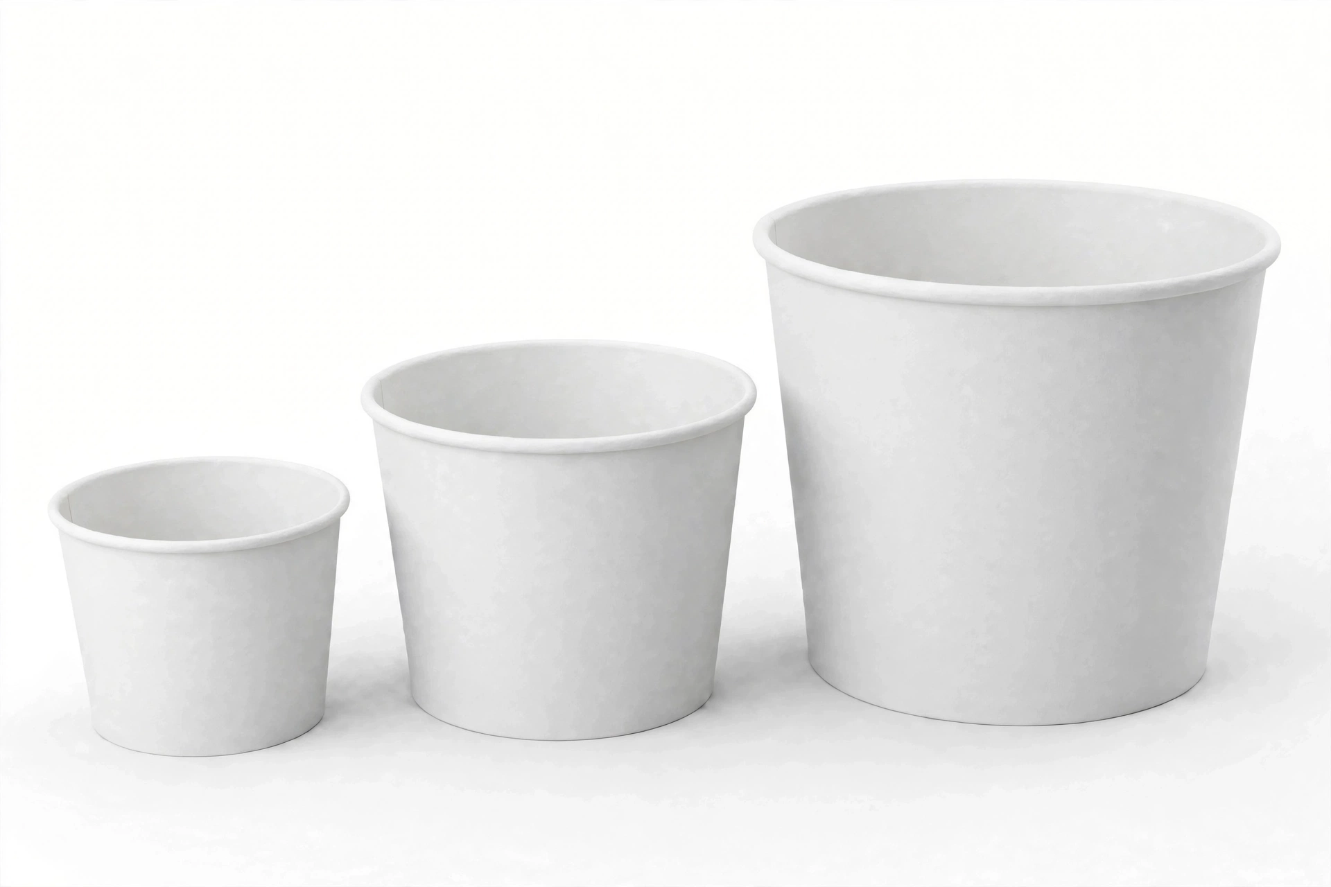 Three white paper food buckets in ascending sizes
